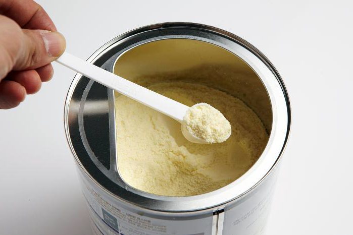 Infant formula container and feeding supplies.