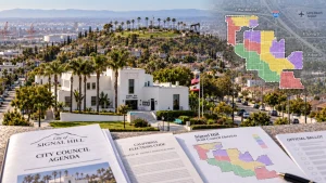 Signal Hill City Hall with draft council district maps and election documents in the foreground.